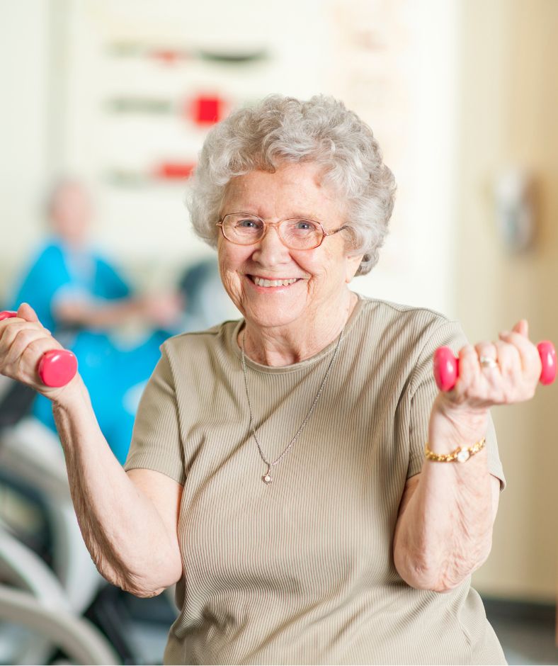 קשישה בתרגילי משוקוליות יד